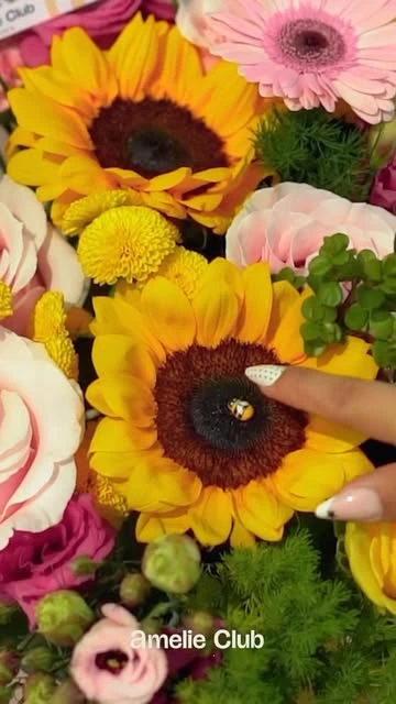 Detalle de girasoles, gerberas y rosas de Amelie Club